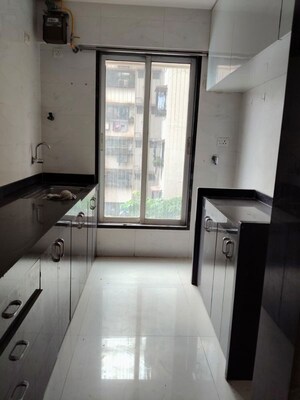 Kitchen in 2 BHK Apartment at Karmvir Avant Sky Villa, Goregaon East – for Rent