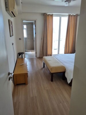 Living Room in 3.5 BHK Apartment at DLF Park Place, Sector 54 – for Rent