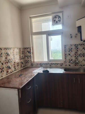Kitchen in 2.5 BHK Apartment at Amrapali Leisure Park, Amrapali Leisure Valley – for Rent