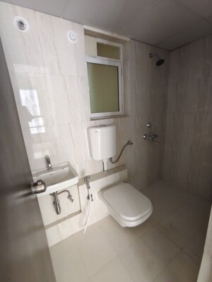 Bathroom in 1 BHK Apartment at Puranik Rumah Bali, Ghodbunder Road – for Rent