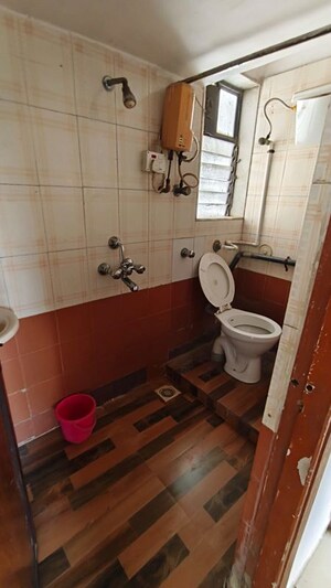 Bathroom in 1 BHK Apartment at Jyoti Complex, Goregaon East – for Rent