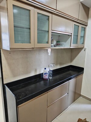 Kitchen in 3 BHK Apartment at Rustomjee Athena, Majiwada – for Rent