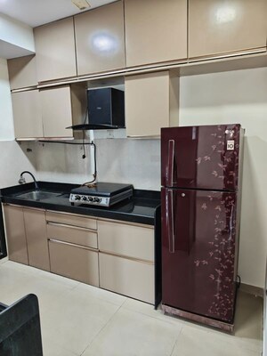 Kitchen in 3 BHK Apartment at Rustomjee Athena, Majiwada – for Rent