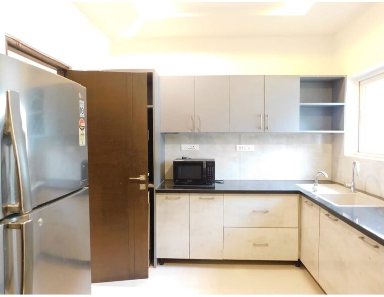 Kitchen, rajapushpa-open-skies 4 Bedroom 5100 Sq.Ft. Villa In Kokapet Hyderabad 10695893