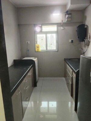 Kitchen in 1 BHK Apartment at DGS Sheetal Tapovan, Malad East – for Sale