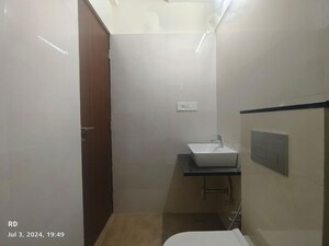 Bathroom in 1 BHK Apartment at Omkar Signet, Malad East – for Rent