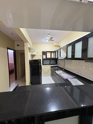 Kitchen in 2 BHK Apartment at Arjun CHS Vasant Vihar, Vasant Vihar – for Rent