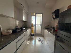 Kitchen in 2 BHK Apartment at Piramal Vaikunth, Balkum Pada – for Rent