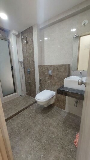 Bathroom in 3 BHK Apartment at Raj Infinia, Malad West – for Rent