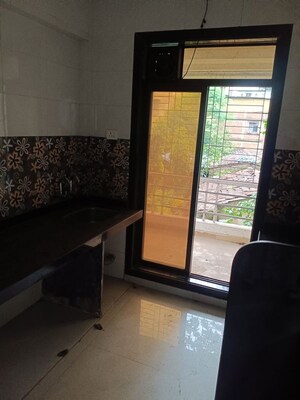 Kitchen in 2 BHK Apartment at RV Waman Heights, Dombivli West – for Sale