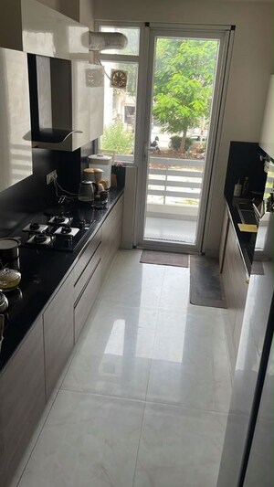 Kitchen in 3 BHK Apartment at Ansal API Esencia, Sector 67 – for Rent