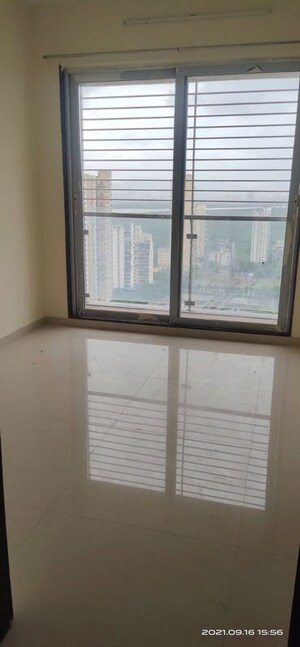 Room in 2 BHK Apartment at Aurum Q Residences, Ghansoli – for Sale