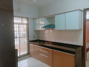 Kitchen in 2 BHK Apartment at Agarwal Paramount, Virar West – for Rent