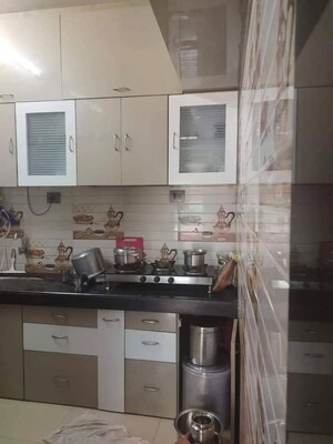 Kitchen in 2 BHK Apartment at Squarefeet Royal Meadows, New Panvel – for Sale