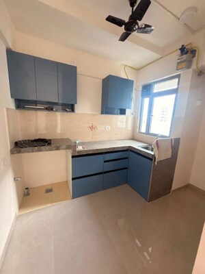 Kitchen in 1 BHK Apartment at Piramal Vaikunth, Balkum Pada – for Rent