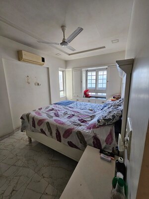 Bedroom in 3 BHK Apartment at Dattvilla CHS, Lalbaug – for Rent