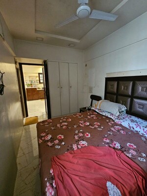 Bedroom in 3 BHK Apartment at Dattvilla CHS, Lalbaug – for Rent