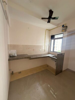 Kitchen in 1 BHK Apartment at Piramal Vaikunth, Balkum Pada – for Rent