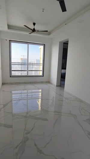 Living Room in 1 BHK Apartment at Pramanik Walchand Paradise, Mira Road – for Sale