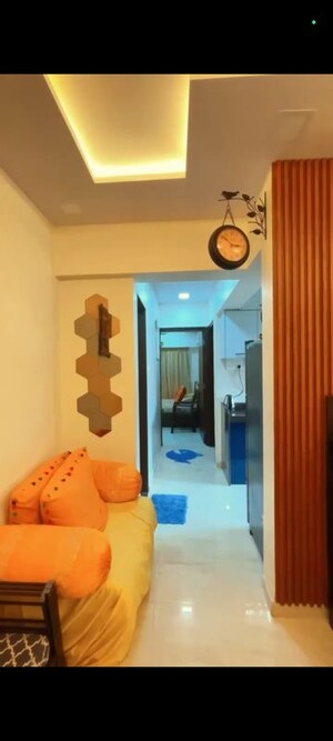 Living Room in 2 BHK Apartment at Kandivali East – for Sale
