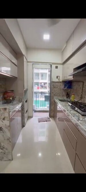 Kitchen in 2 BHK Apartment at Man Opus, Mira Road – for Sale