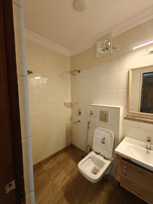 Bathroom in 1 BHK Builder Floor at Khirki Extension – for Rent