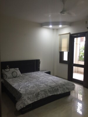 Bedroom in 2 BHK Builder Floor at Nehru Enclave – for Rent