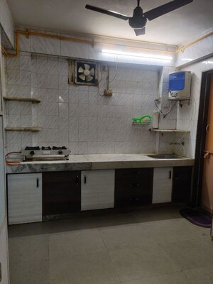 Kitchen in 2 BHK Apartment at Kanak Kala Apartment, Satellite – for Rent