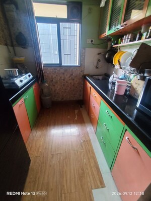 Kitchen in 1.5 BHK Apartment at Squarefeet Grand Square, Anand Nagar – for Rent
