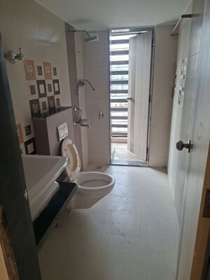 Bathroom in 2 BHK Apartment at Jangid Galaxy, Ghodbunder Road – for Rent