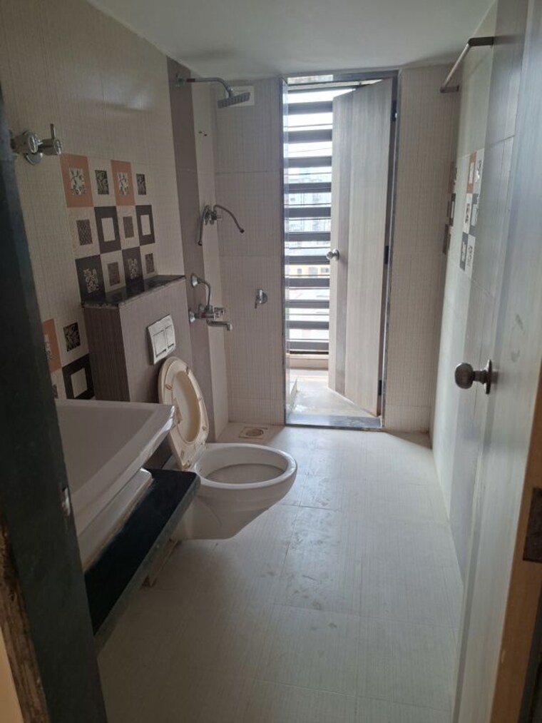 Bathroom, jangid-galaxy 2 Bedroom 711 Sq.Ft. Apartment In Ghodbunder Road Thane 10696956