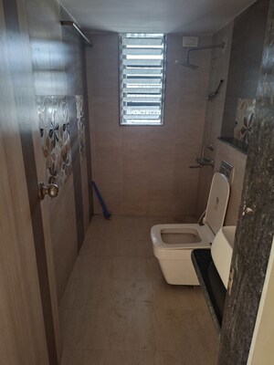 Bathroom in 2 BHK Apartment at Jangid Galaxy, Ghodbunder Road – for Rent