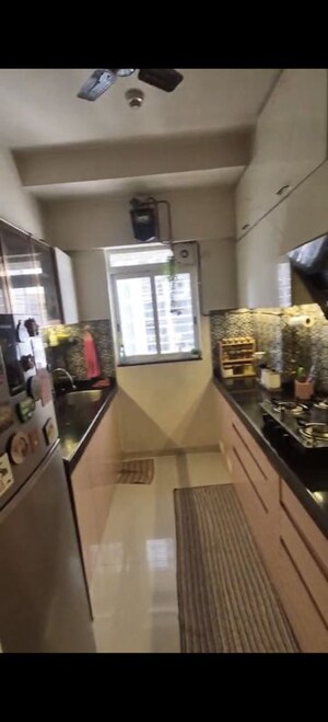 Kitchen in 1 BHK Apartment at Lodha Amara, Kolshet Road – for Sale