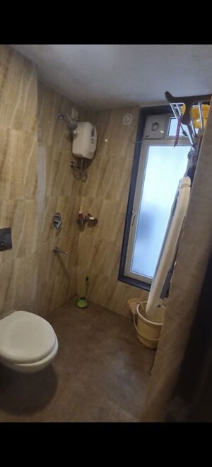 Bathroom in 1 BHK Apartment at Lodha Amara, Kolshet Road – for Sale