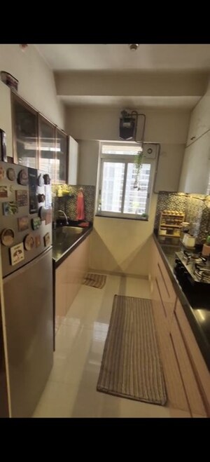 Kitchen in 1 BHK Apartment at Lodha Amara, Kolshet Road – for Sale