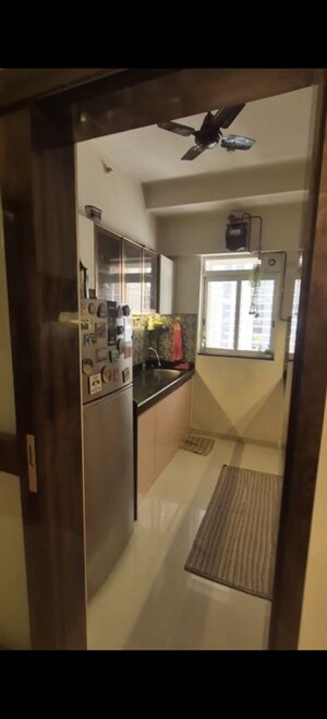 Kitchen in 1 BHK Apartment at Lodha Amara, Kolshet Road – for Sale