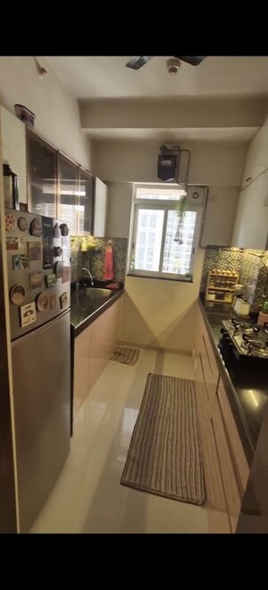 Kitchen in 1 BHK Apartment at Lodha Amara, Kolshet Road – for Sale
