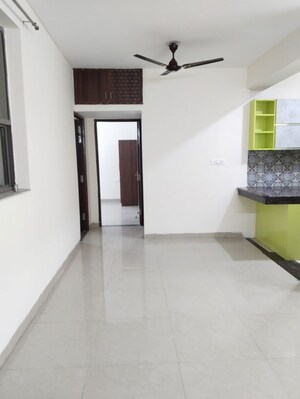 Living Room in 2 BHK Apartment at Unitech Uniworld Gardens 2, Sector 47 – for Rent