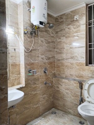 Bathroom in 2 BHK Apartment at Unitech Uniworld Gardens 2, Sector 47 – for Rent