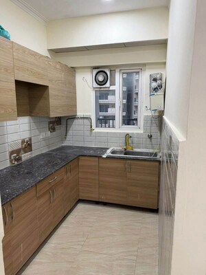 Kitchen in 2 BHK Apartment at Gaur City 2 - 14th Avenue, Sector 16c Greater Noida – for Rent