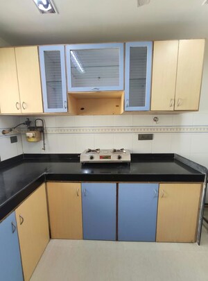 Kitchen in 1 BHK Apartment at Agarwal Trinity Towers, Malad West – for Rent
