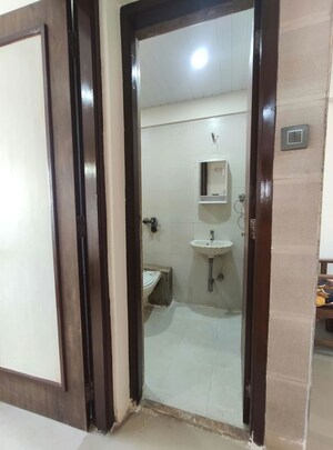 Bathroom in 1 BHK Apartment at Agarwal Trinity Towers, Malad West – for Rent