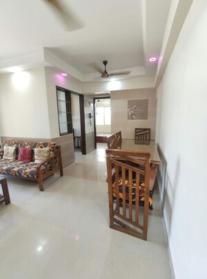 Living Room in 1 BHK Apartment at Agarwal Trinity Towers, Malad West – for Rent