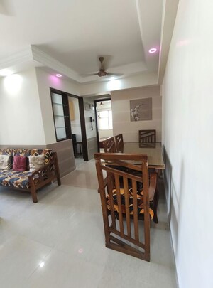 Living Room in 1 BHK Apartment at Agarwal Trinity Towers, Malad West – for Rent