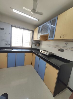 Kitchen in 1 BHK Apartment at Agarwal Trinity Towers, Malad West – for Rent