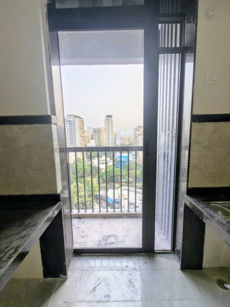 Balcony, dhamji-shamji-mahavir-spring-tulip-phase-1 2 Bedroom 716 Sq.Ft. Apartment In Pokhran Road No Two Thane 10697058