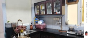 Kitchen in 3.5 BHK Apartment at Vipul Greens, Sector 48 – for Sale