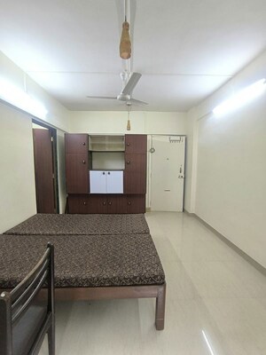Bedroom in 1 RK Apartment at Rajendra Vihar CHS, Malad West – for Rent
