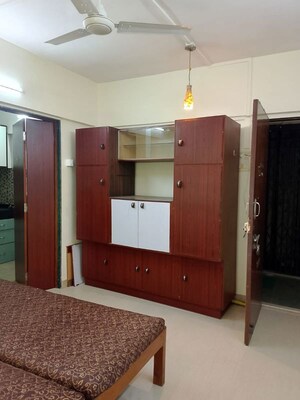 Bedroom in 1 RK Apartment at Rajendra Vihar CHS, Malad West – for Rent