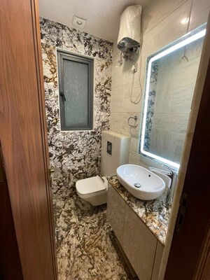 Bathroom in 3 BHK Apartment at DLF Hamilton Court, Sector 27 – for Sale